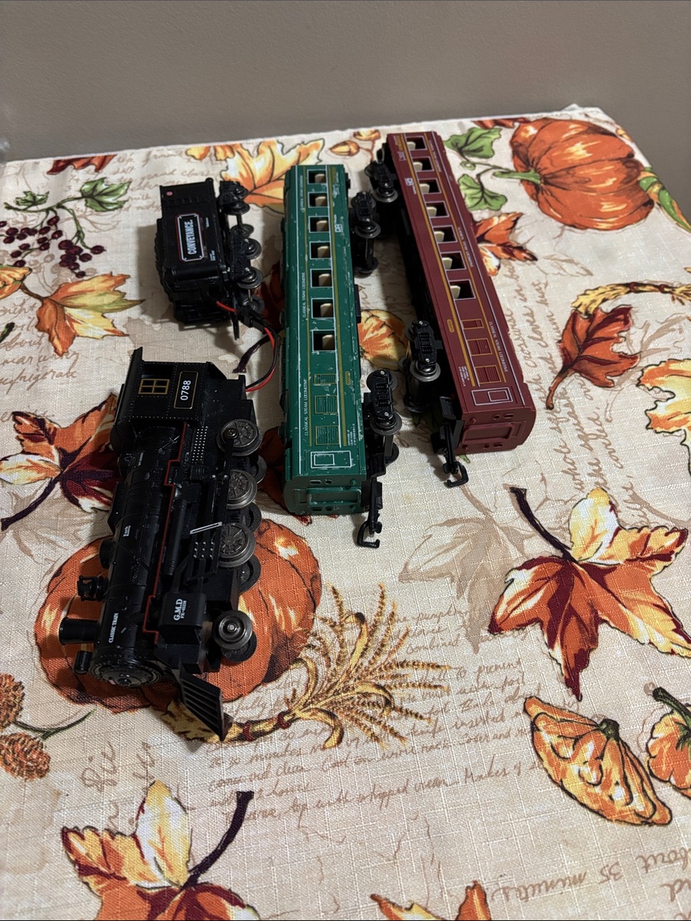 Vintage-Inspired Toy Train Set - Black Engine with Green & Maroon Cars
